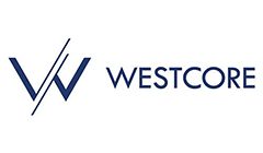 A blue and white logo of westcott