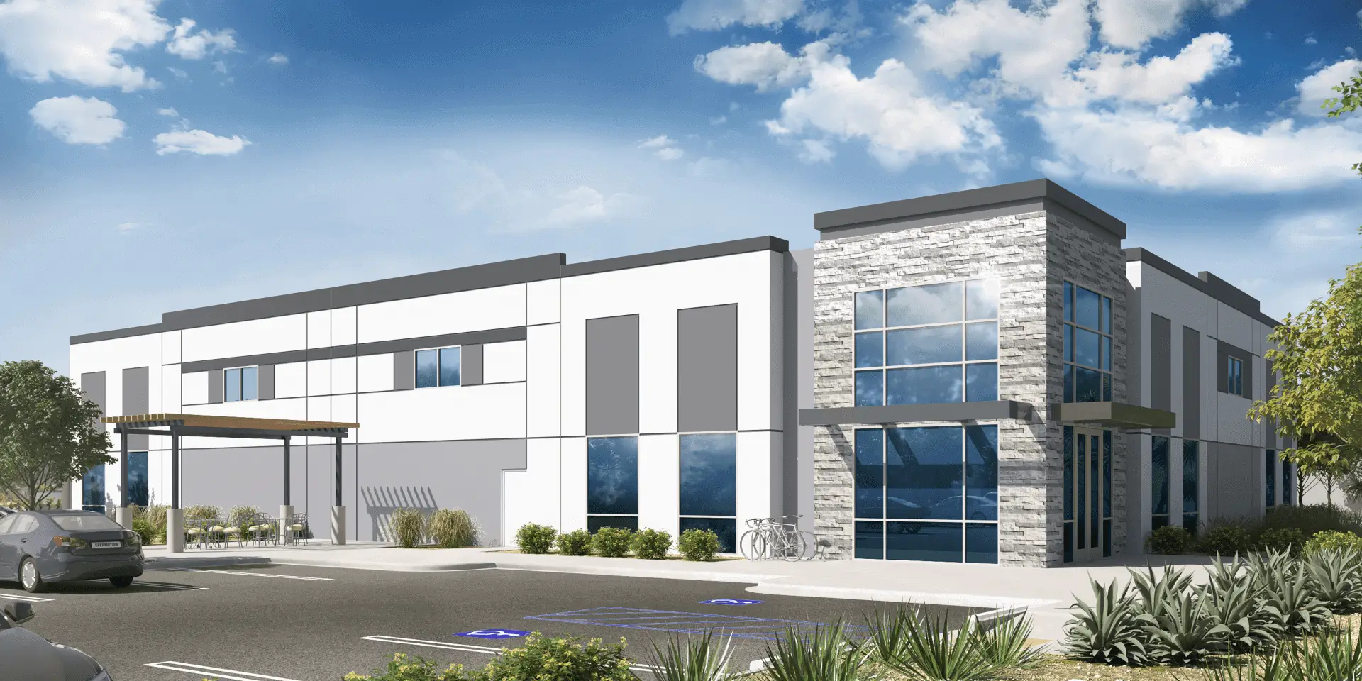 Modern industrial building with stone facade.